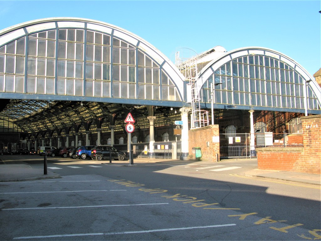 The covered taxi rank beneath the Victorian train shed at Darlington Station